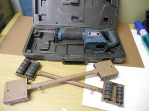 lot 131 image: Cordless recipricating saw in case (no batterycharger) and machineryappliancefurniture rollers