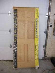 lot 16 image: Mastercraft Oak 6 Panel Prehung Door - Wood Core - 32 LH