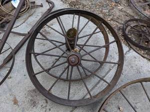 lot 243 image: Pair of Rusty Wagon Wheels