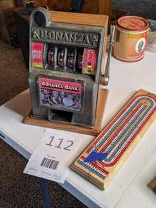 lot 112 image: Bonanza Bank Slot Machine and Cribbage Board