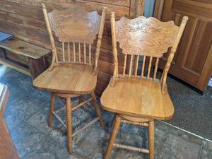 lot 172 image: Pair of Oak Pressed Back BarKitchen Swivel Stools