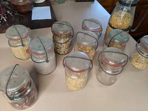 lot 182 image: Lot of 11 Assorted Glass Canning Jars with Wire Bail Lids
