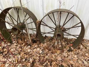 lot 278 image: Two Moss Covered Wagon Wheels