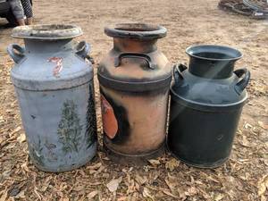 lot 238 image: Three Antique Steel Milk Jugs
