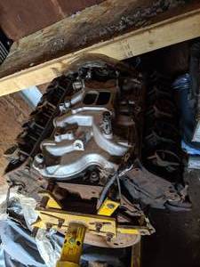 lot 212 image: 460 Ford Engine & Stand with Edelbrock Intake