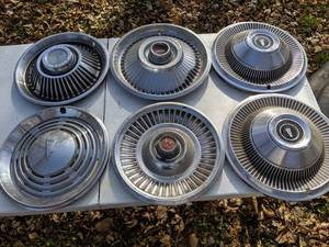 lot 206 image: (6) Vintage Hubcaps