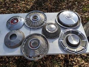 lot 207 image: (7) Vintage Hubcaps