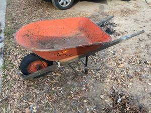 lot 442 image: Orange Metal Wheelbarrow