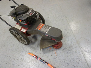 lot 5 image: Swisher Fully Adjustable Wheeled Trimmer