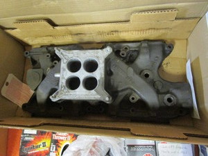lot 34 image: 1964 12 Mustang 289 Intake & Misc.