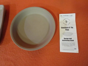 lot 70 image: Pampered Chef Stoneware Pie Pan & Baking Sheet