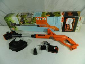 lot 31 image: Black and Decker 20 volt Cordless String Trimmer