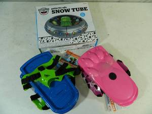 lot 87 image: New Snow Tube, and Snow Shoes