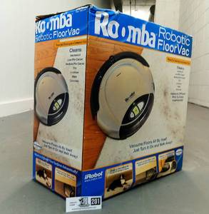 lot 201 image: Original Roomba Robotic Floor Vac, Never Used Still in Box