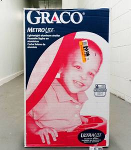lot 242 image: Graco MetroLite Lightweight Aluminum Stroller Never Used, Still in its Original Box