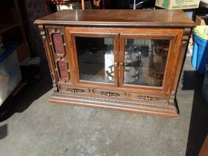 lot 3 image: Lighted Portable Bar Cabinet ON Wheels (42x19x31) With Built In Bottle Rack, Lazy Susan, Goblet Rack & Shelves