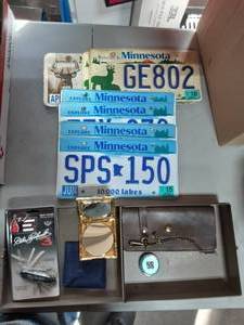 lot 9 image: Old License Plates, New Dale Earnhardt Pocket Knife, Chain Wallet, Misc.