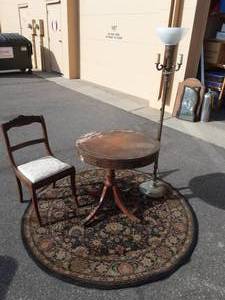 lot 13 image: 63 Round Rug, 28 Parlor Table On Casters
