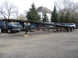 lot 1 image: 2008 Take 3 Car Hauler Wedge Trailer