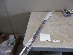lot 94 image: (2) Door Sweeps and Felt