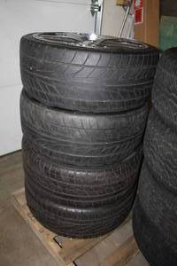 Lot of (4) Nitto Extreme 24535R20 Tires with 20 5-Lug Wheels