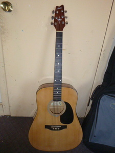 lot 70 image: Montana Hand Crafted Acoustic Guitar