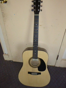 lot 71 image: Johnson Acoustic Guitar