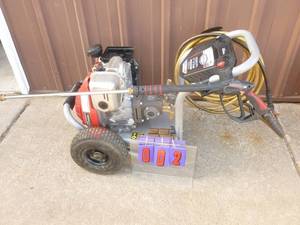 3400 psi pressure washer with Honda motor. Runs but unable to fully test. Includes hose & wand but will need air cleaner & cover. As shown.