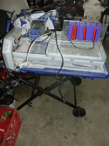 Kobalt tile saw unit. Works but will need new cord & stand needs to be attached. As shown.