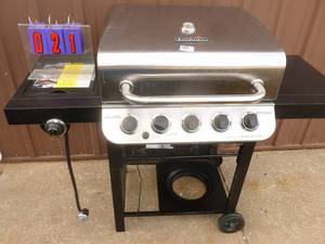 Charbroil gas grill. Unused with replacement grates. As shown.