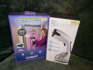 lot 55 image: Sienna VELA On-the-Go Garment Steamer & Door Pad Accessory