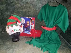 lot 18 image: Elf on a Shelf Doll, Book wSound & Adult Elf Suit