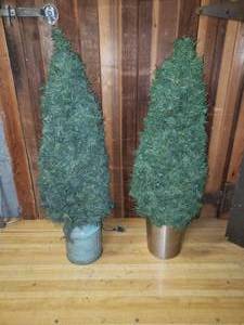 lot 105 image: Two 4 Artificial Evergreen Trees 