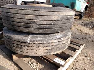 lot 147 image: (2) 11R22.5 Tires on Hub Pilot Rims...