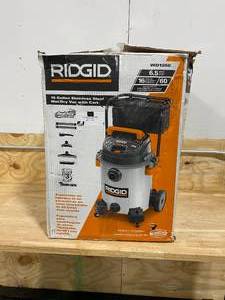 lot 3 image: RIGID 16 Gal. 6.5-Peak HP Stainless Steel WetDry Shop Vacuum with Filter, Hose and Accessories