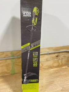 lot 26 image: RYOBI 18 in. 10 Amp Attachment Capable Electric String Trimmer