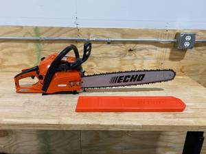 lot 102 image: ECHO 20 in. 50.2 cc Gas 2-Stroke Cycle Chainsaw