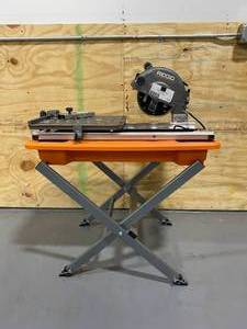 lot 111 image: RIGID 9 Amp Corded 7 in. Wet Tile Saw with Stand