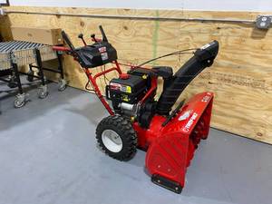 lot 1 image: TROY-BILT Storm 30 in. 357cc Two-Stage Electric Start Gas Snow Blower with Power Steering and Heated Grips