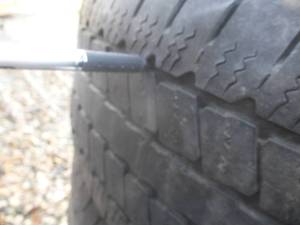 lot 13 image: Goodyear Wrangler SRA Tires