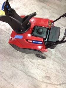 lot 107 image: Power Clear 721 E 21 in. 212 cc Single-Stage Self Propelled Electric Start Gas Snow Blower by Toro in good conditions