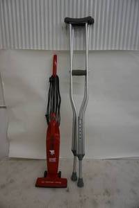 lot 92 image: Dirt Devil Simpli Stik 3-in-One Vacuum  Crutches