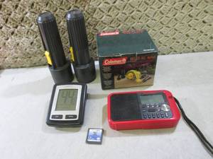 lot 21 image: Coleman Pump First Alert Radio DS G...