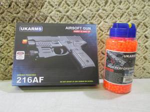 lot 104 image: Pistol Airsoft Gun with Laser and B...