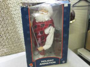 lot 203 image: Animated Golfing Santa Approx 23 T...