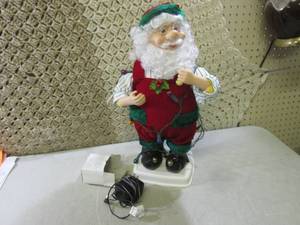 lot 207 image: 19 Electric Animated Lightup Santa...
