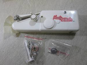 lot 226 image: Handy Stitch Handheld Sewing Machin...