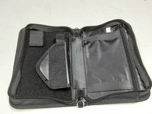 lot 67 image: Padfolio Gun Holder
