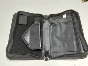 lot 68 image: Padfolio Gun Holder