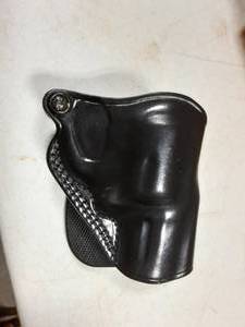 lot 71 image: Leather Gun Holster For 38 Revolver